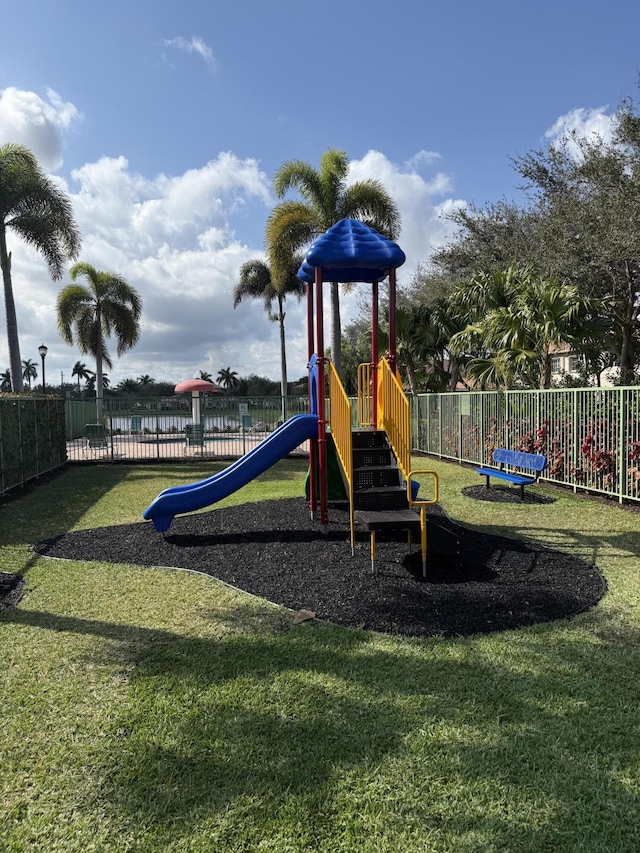 view of playground featuring a yard