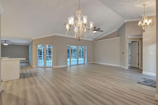 unfurnished living room with ceiling fan with notable chandelier, light wood-type flooring, and ornamental molding