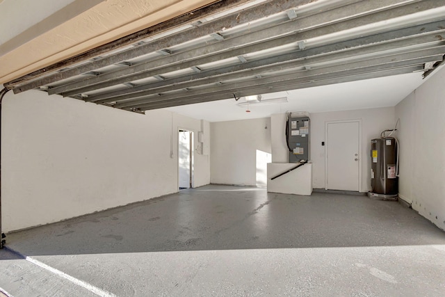 garage with heating unit and electric water heater