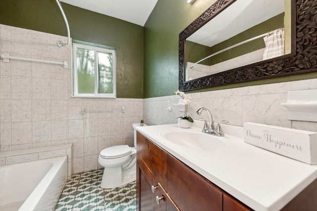 full bathroom with tile walls, shower / bath combo with shower curtain, toilet, vanity, and tile patterned floors