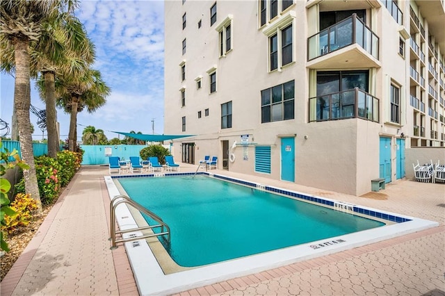 view of pool with a patio