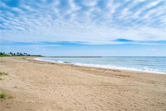 property view of water with a beach view