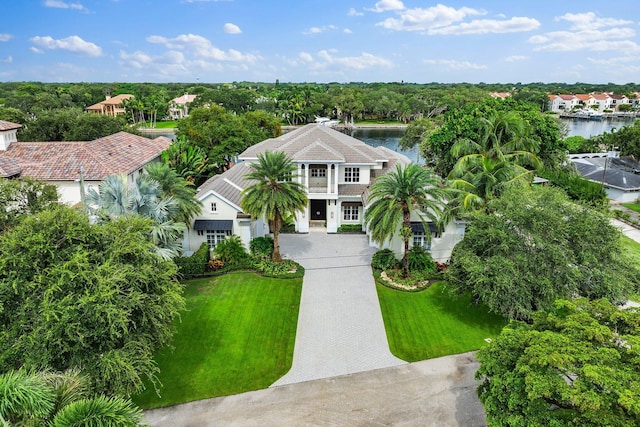 birds eye view of property featuring a water view