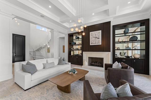 tiled living room featuring beam ceiling, ornamental molding, coffered ceiling, and ornate columns