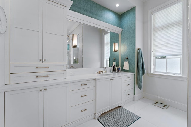 13209 Rolling Green Rd, North Palm Beach, FL 33408 - full bathroom with vanity, tile patterned floors, and baseboards