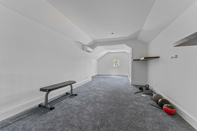 13209 Rolling Green Rd, North Palm Beach, FL 33408 - exercise room with carpet floors, vaulted ceiling, and baseboards