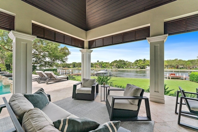 13209 Rolling Green Rd, North Palm Beach, FL 33408 - view of patio featuring a water view and outdoor lounge area