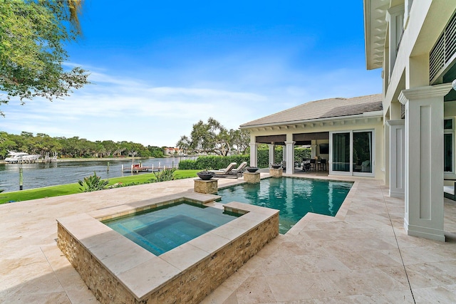 13209 Rolling Green Rd, North Palm Beach, FL 33408 - outdoor pool with an in-ground hot tub, a patio, and a water view