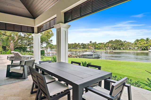 view of patio / terrace with a water view