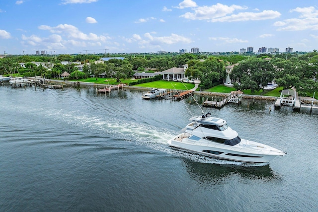 13209 Rolling Green Rd, North Palm Beach, FL 33408 - water view featuring nearby urban area and a boat dock