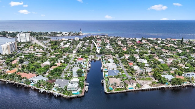 drone / aerial view with a water view