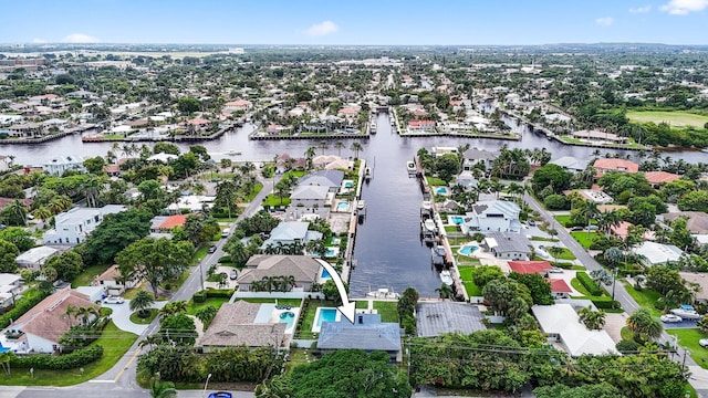 aerial view featuring a water view and a residential view