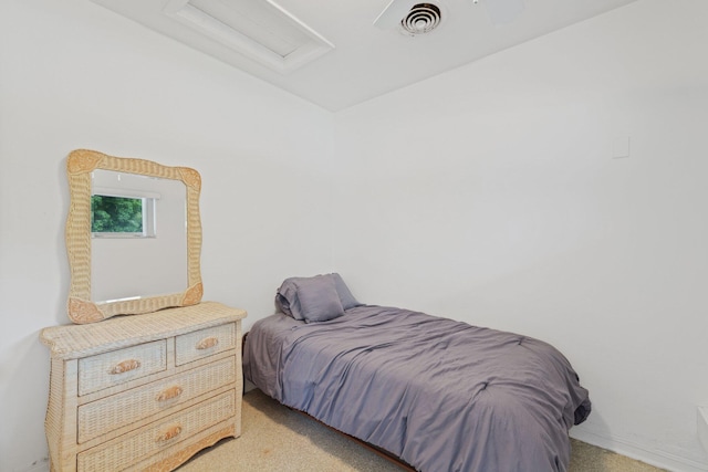 bedroom with light colored carpet