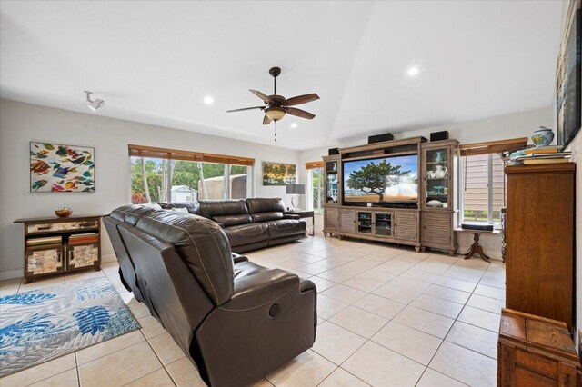 living room with ceiling fan and light tile patterned floors