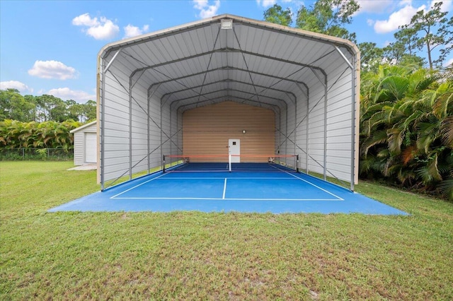 exterior space with a carport and a yard