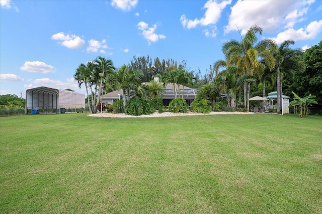 view of yard with a carport