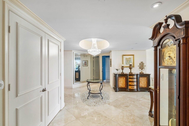 hallway with ornamental molding and light tile patterned floors