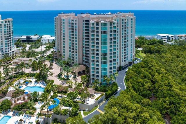 birds eye view of property with a water view