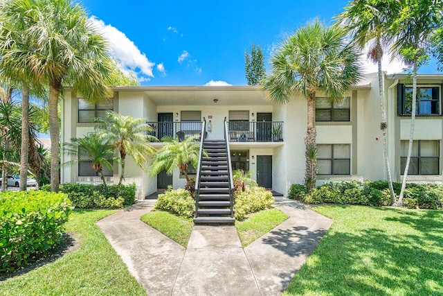 view of front of home with a front yard