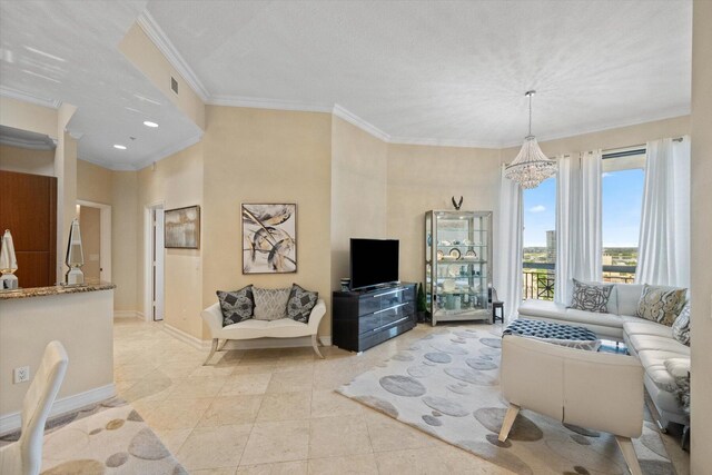 living room with light tile patterned floors, crown molding, and a chandelier