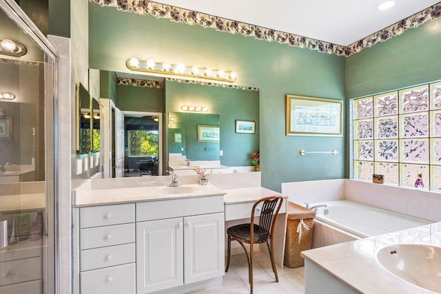 bathroom with vanity, shower with separate bathtub, and tile patterned flooring