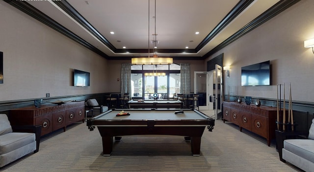 playroom with a tray ceiling, light colored carpet, crown molding, and pool table