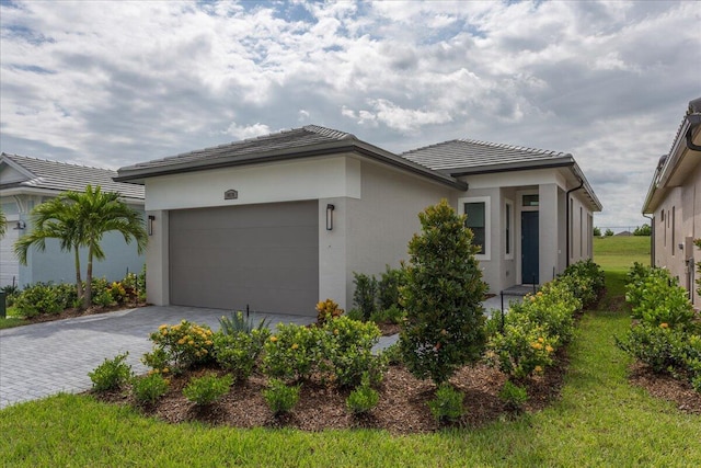 view of front of property with a garage