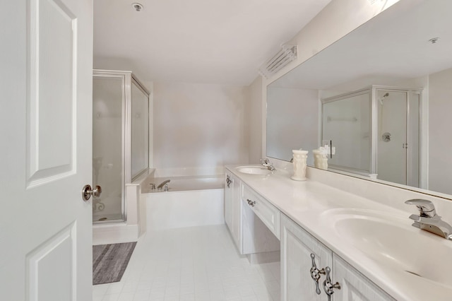 bathroom featuring separate shower and tub and vanity