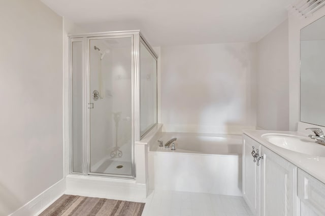 bathroom featuring vanity, hardwood / wood-style flooring, and independent shower and bath