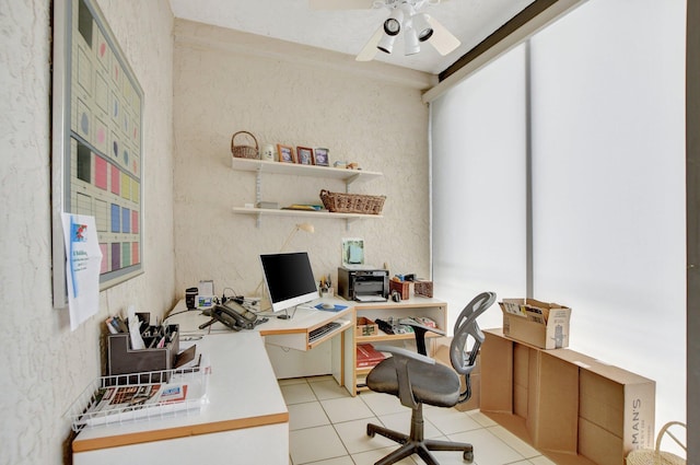 office space featuring light tile patterned floors and a ceiling fan