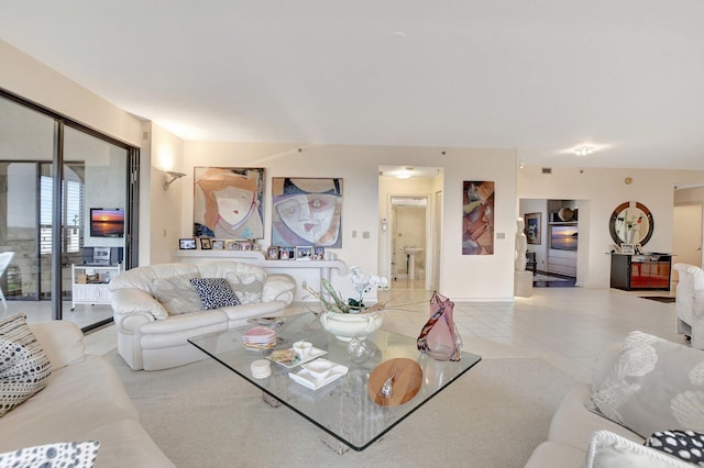 living area with light tile patterned flooring