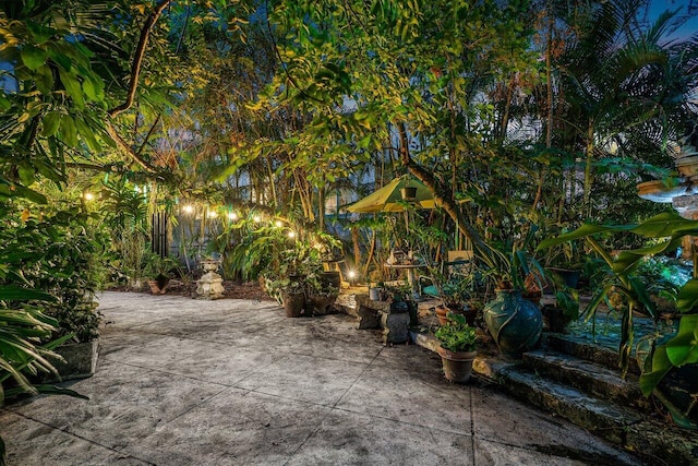 view of patio at night