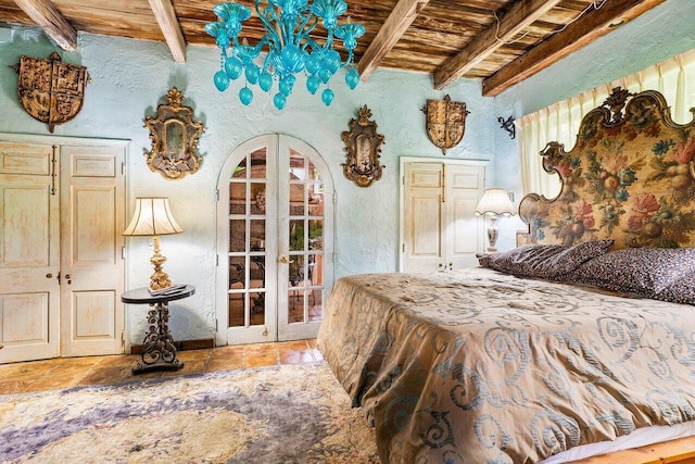 bedroom with tile patterned floors, beam ceiling, and wooden ceiling