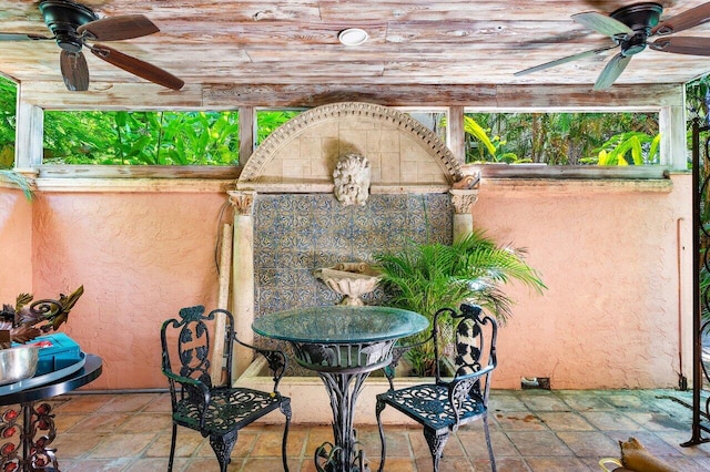 view of patio with ceiling fan