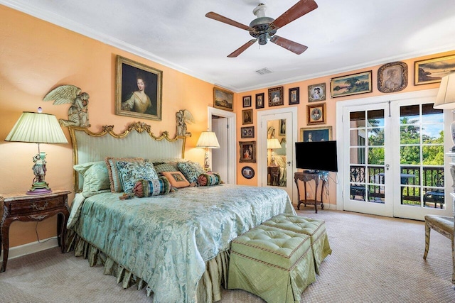 bedroom with french doors, access to outside, ceiling fan, crown molding, and light colored carpet