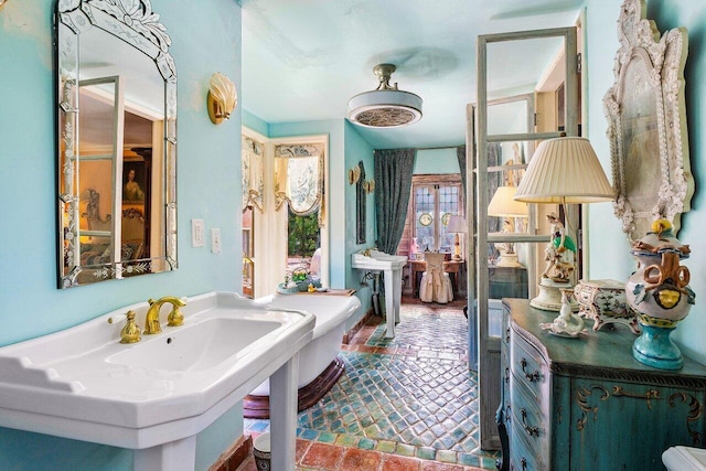 bathroom featuring sink and tile patterned floors