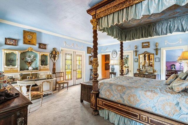 bedroom featuring carpet, french doors, and crown molding