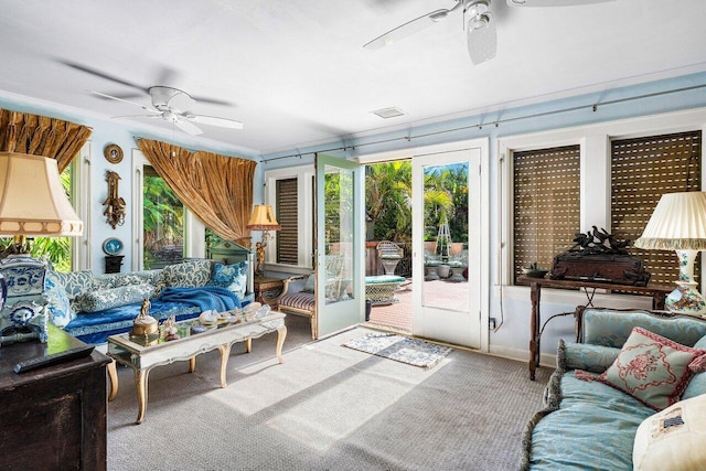 sunroom / solarium with ceiling fan