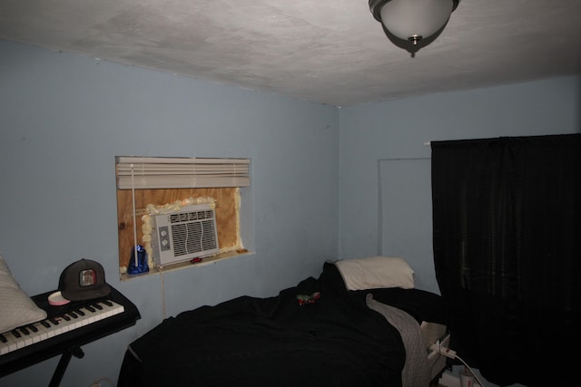 bedroom featuring a textured ceiling