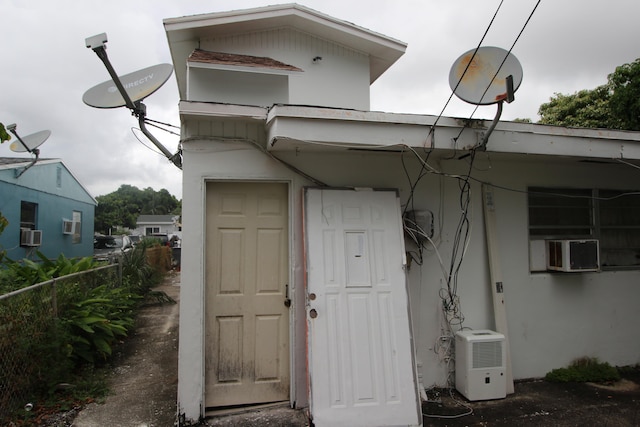 view of exterior entry with cooling unit