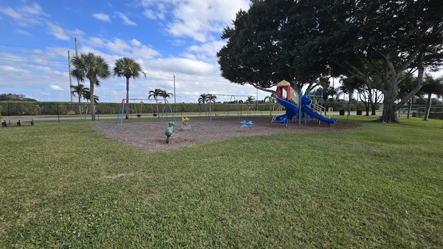 view of jungle gym with a lawn