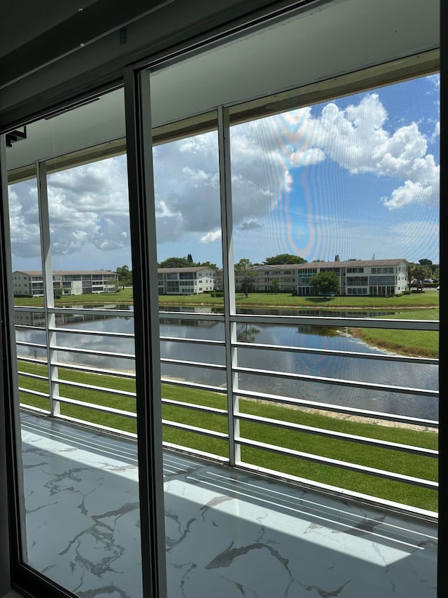 exterior space with a water view