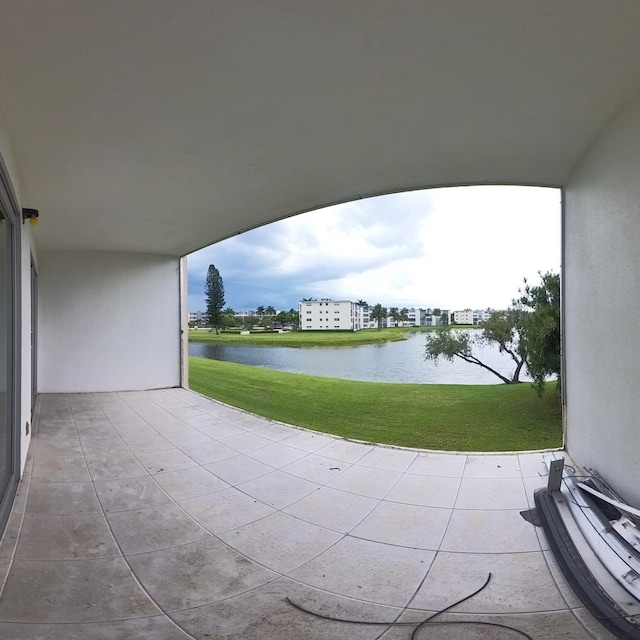 view of patio / terrace with a water view