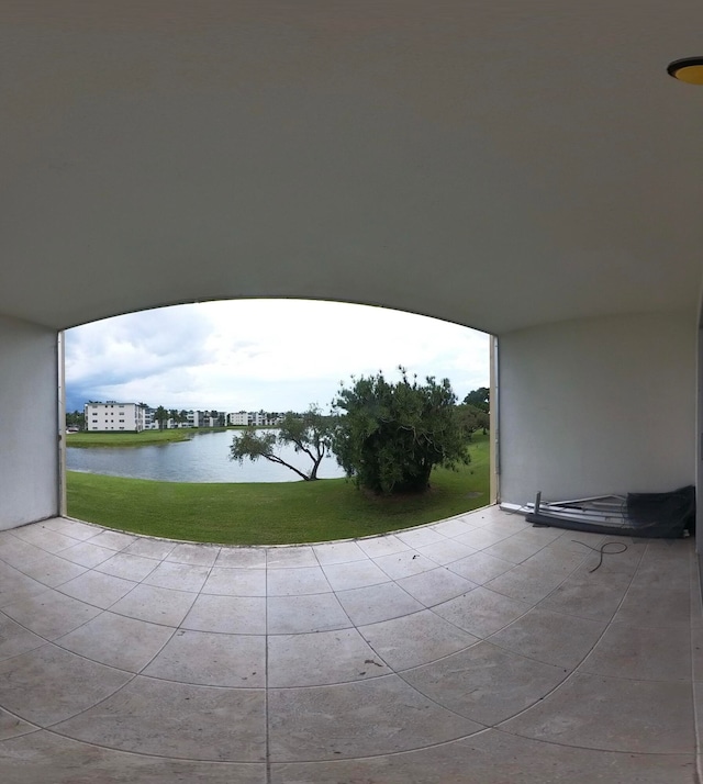 view of patio featuring a water view