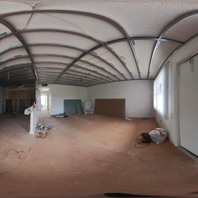 additional living space with a wealth of natural light and vaulted ceiling