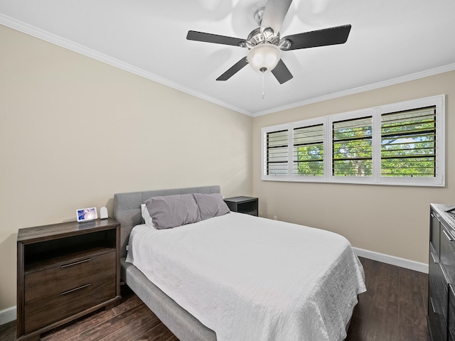 bedroom featuring ceiling fan, crown molding, and dark hardwood / wood-style floors