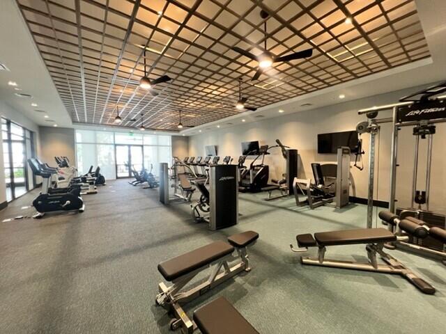 gym featuring ceiling fan