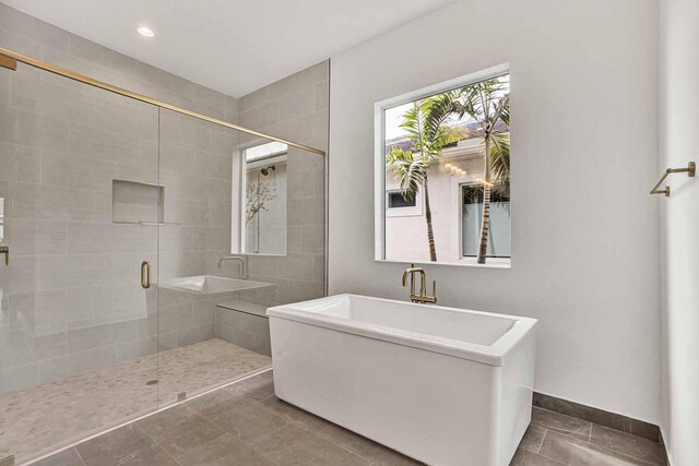 bathroom featuring vanity, toilet, and walk in shower