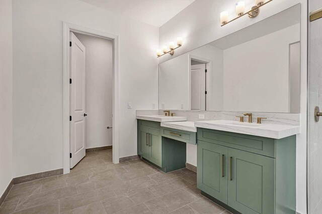 bathroom with vanity, toilet, and tile patterned flooring