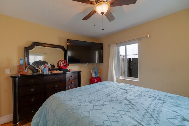 bedroom featuring ceiling fan